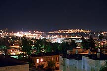 [ View of the Old City of Jerusalem from the Livnot rooftop at night. 
Note the shooting star. :) ]