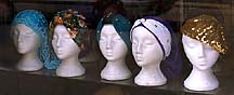 [
Head coverings in Machne Yehuda (Jewish market) shop window ]