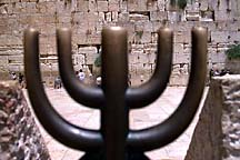 [ Menorah decoration against the Kotel, Jerusalem ]