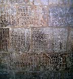 [ Crosses scratched into the wall in the Church of the Holy
Sepulchre, Jerusalem ]